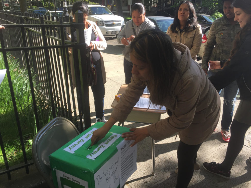 Parents voting in school election