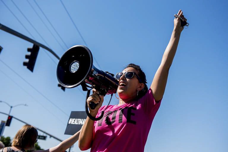 Sol Rivas speaking at a community march and rally in Merced, California, photo credit should go to “Building Healthy Communities Merced