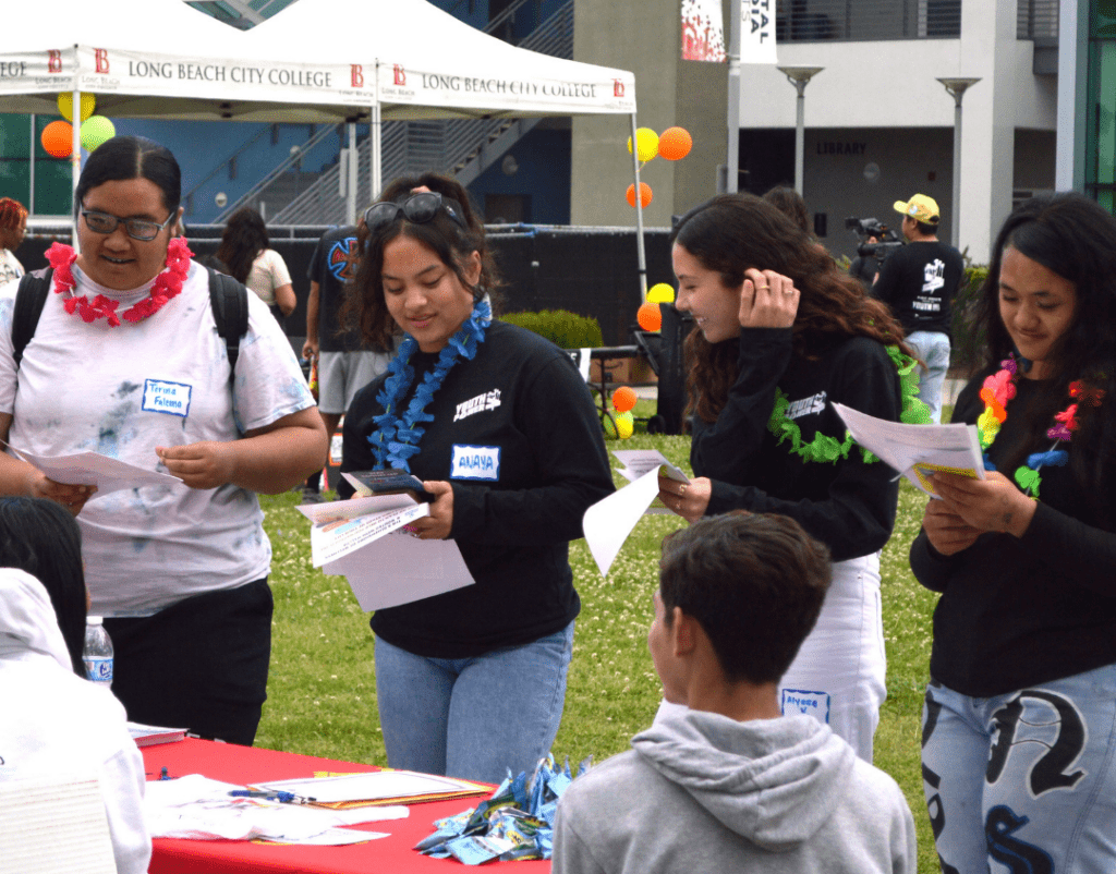 A group of youth participate in an idea collection session.